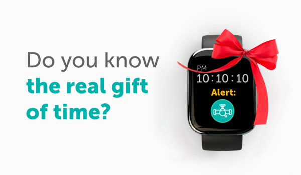 The words "Do you know the real gift of time?" next to a digital watch with a ribbon tied to it
